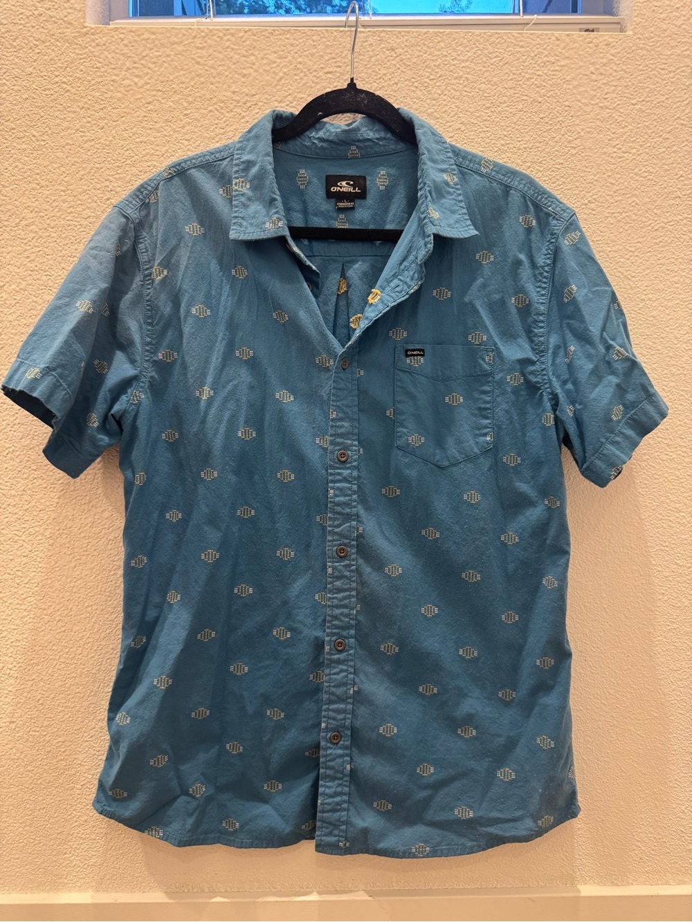 O'Neill blue short-sleeve button-up shirt w/ all-over geometric diamond pattern